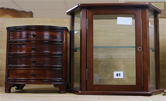 A miniature mahogany bow front chest and a small display cabinet height 24 cm and 31cm